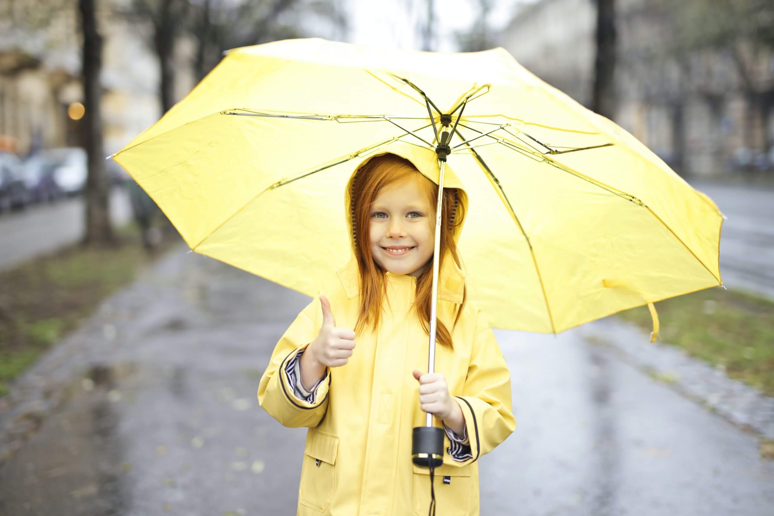rain girl in yellow