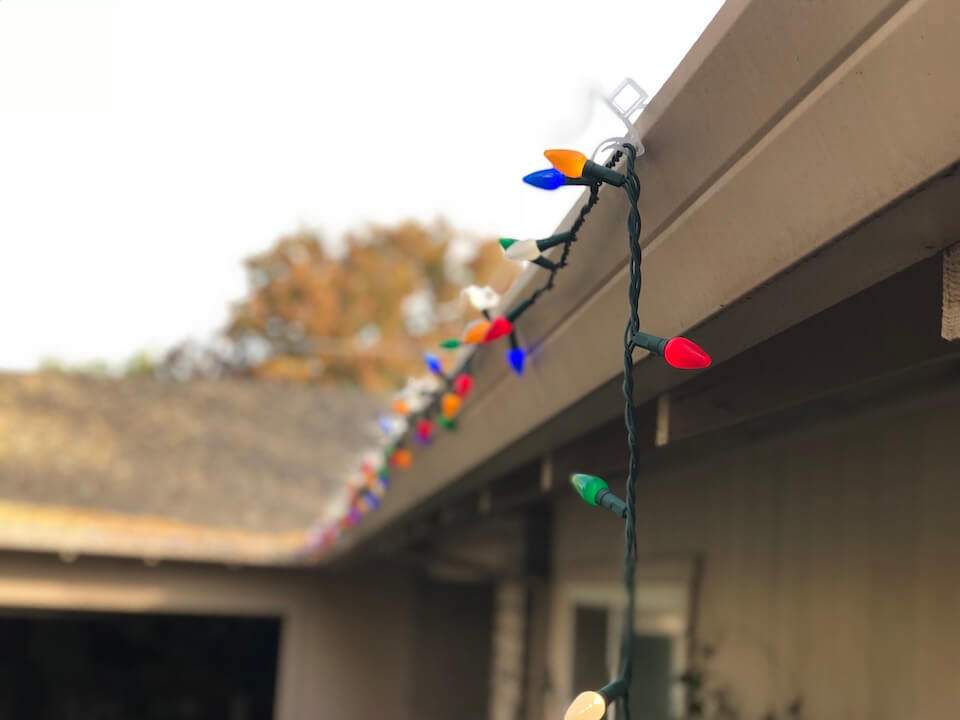 How to Take Down Christmas Lights Without Damaging Your Roofing